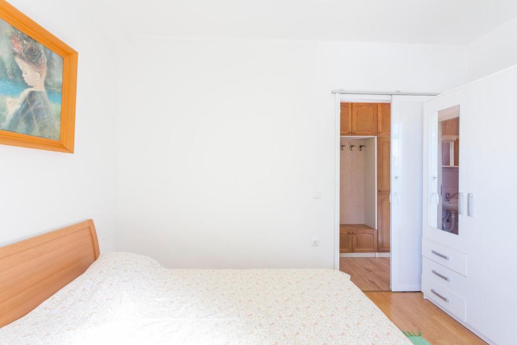 Postel nebo postele na pokoji v ubytování Green garden Rooms & Apartments