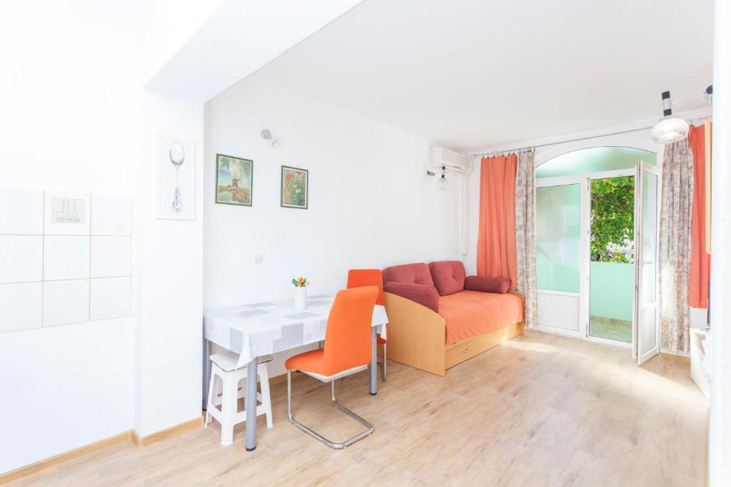 Posezení v ubytování Green garden Rooms & Apartments