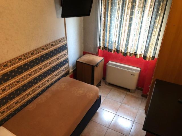Postel nebo postele na pokoji v ubytování Hotel Il Granaio