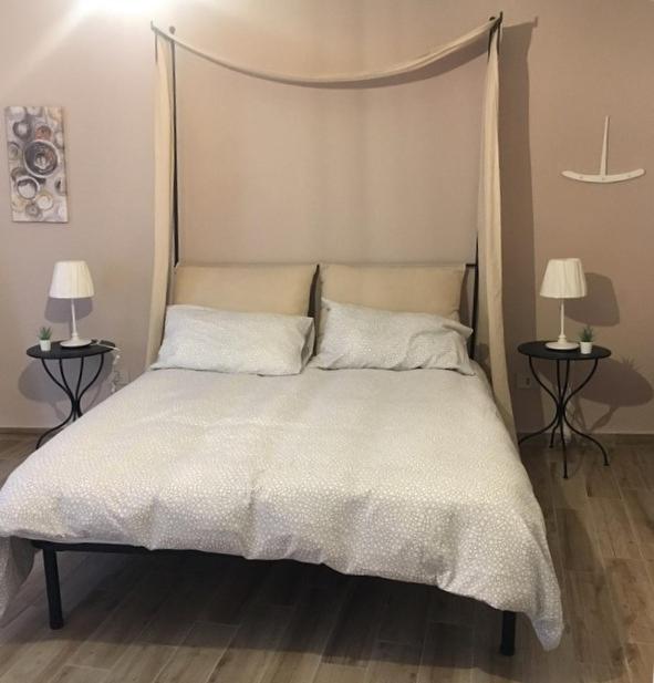 Posteľ alebo postele v izbe v ubytovaní IL PANARO