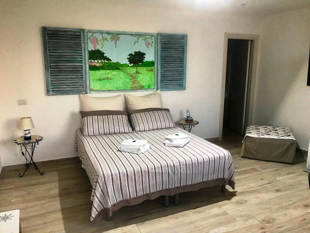 Postel nebo postele na pokoji v ubytování B&B Magna Grecia