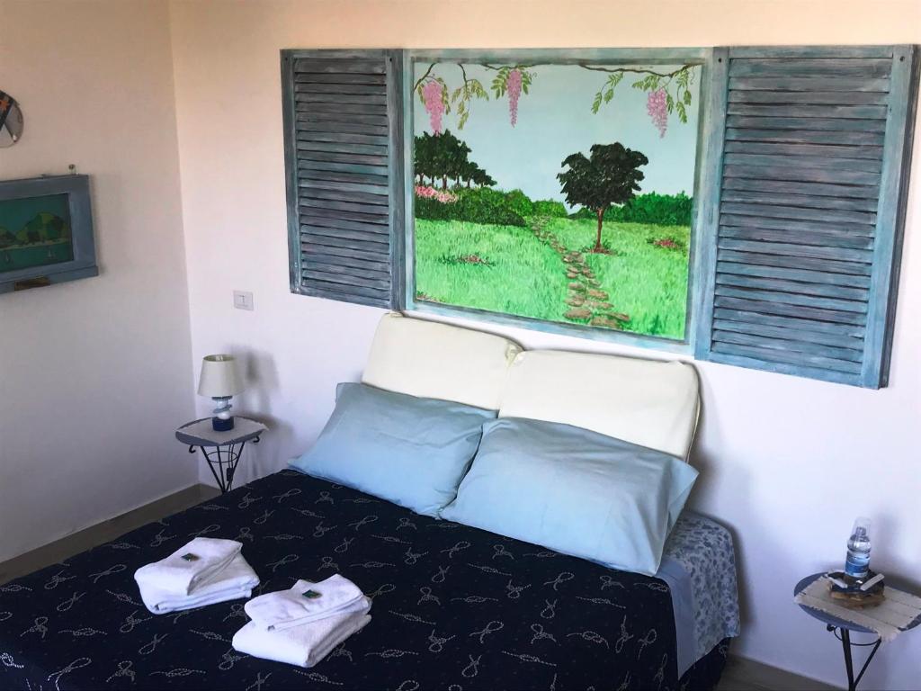Postel nebo postele na pokoji v ubytování B&B Magna Grecia