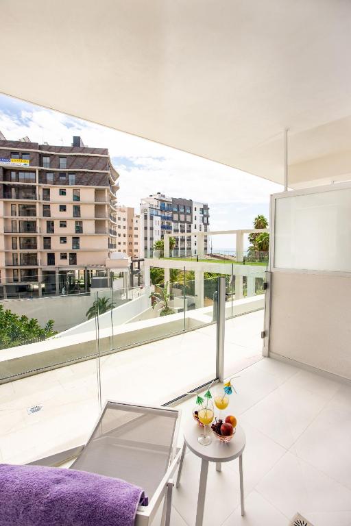 a living room with a view of a building at Calpe Beach in Calpe