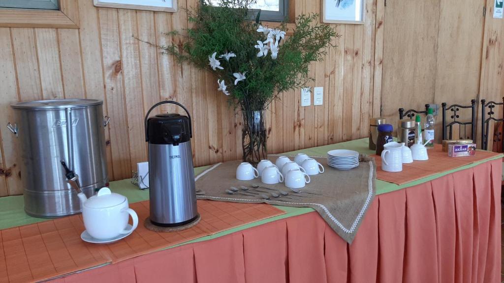 Příslušenství pro přípravu čaje a kávy v ubytování Achibueno Lodge