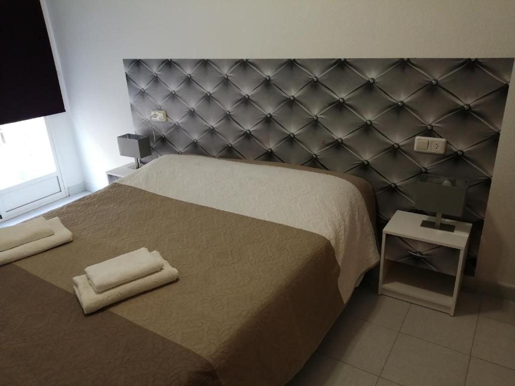 Postel nebo postele na pokoji v ubytování Casas Holiday - Playa del Cura 2