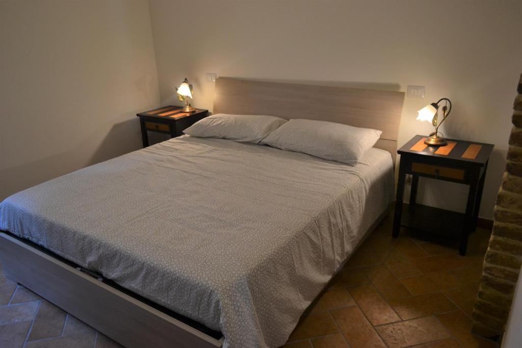Posteľ alebo postele v izbe v ubytovaní Torre alle Antiche Mura