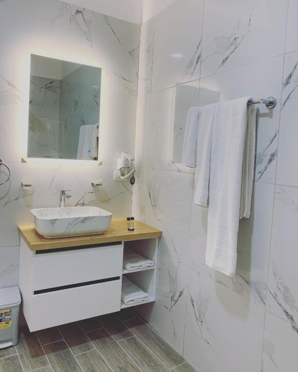 Koupelna v ubytování BELUX HOTEL