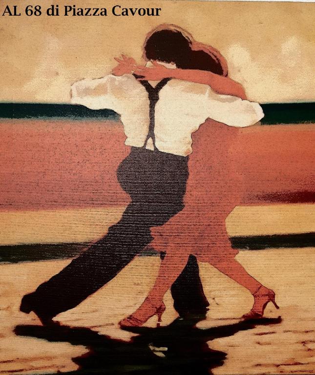 a painting of a man and a woman dancing at Al 68 Di Piazza Cavour in Naples