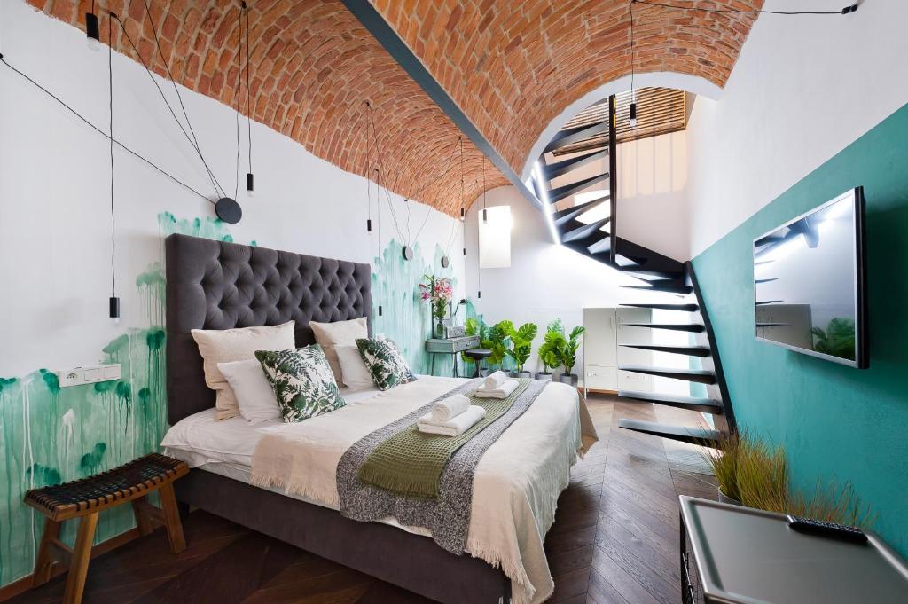 Posteľ alebo postele v izbe v ubytovaní House of Loft Affair