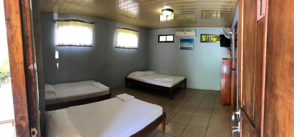 Postel nebo postele na pokoji v ubytování Cabinas Mifran