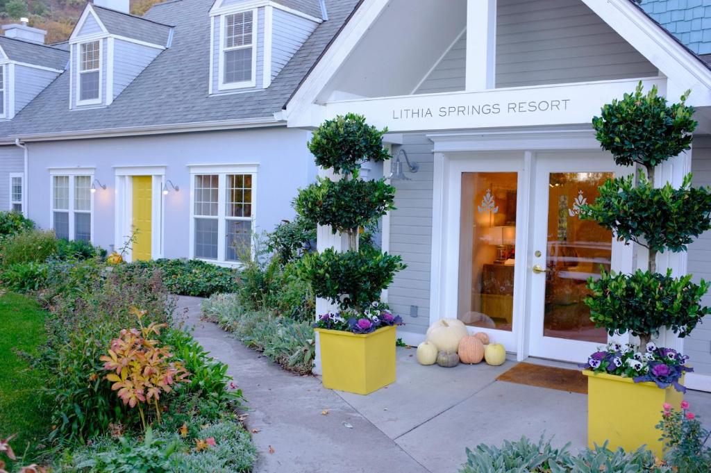 a house with pumpkins in front of the front door at Lithia Springs Resort in Ashland