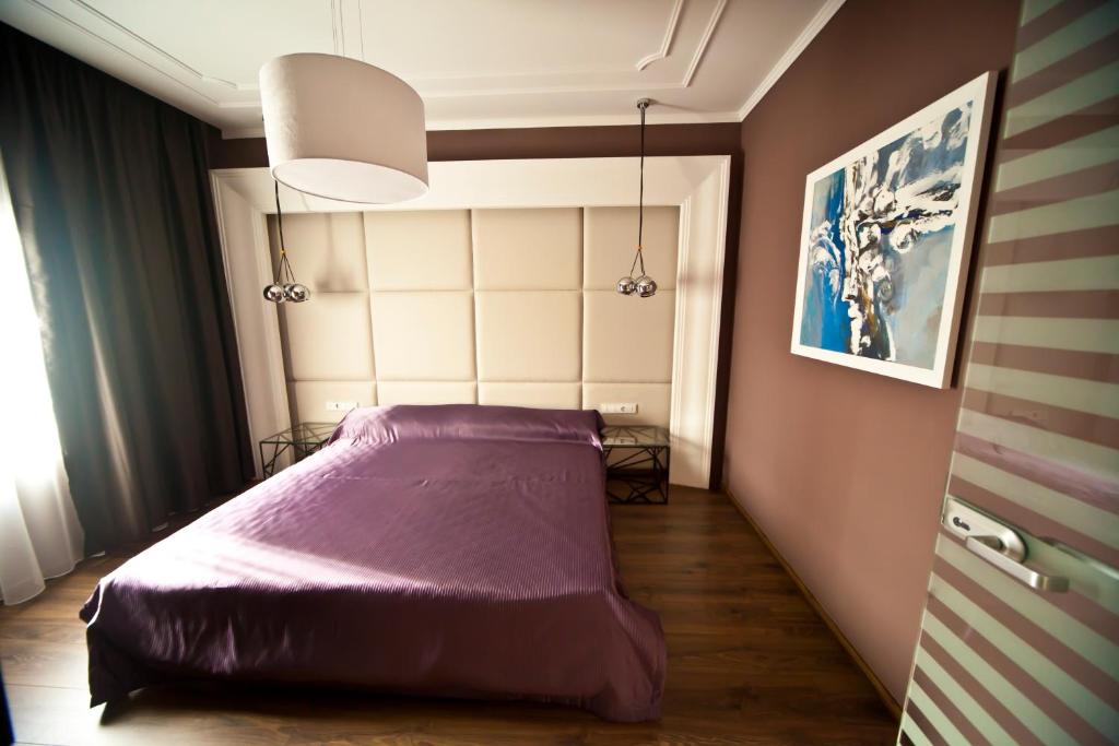 Postel nebo postele na pokoji v ubytování Hotel Confort