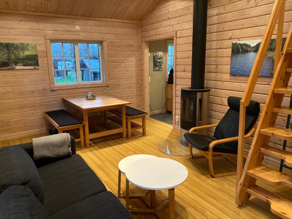 Posezení v ubytování Ferienhaus Stenbäcken in Mittelschweden