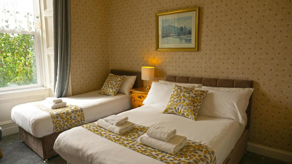 Letto o letti in una camera di Arrandale Guest House