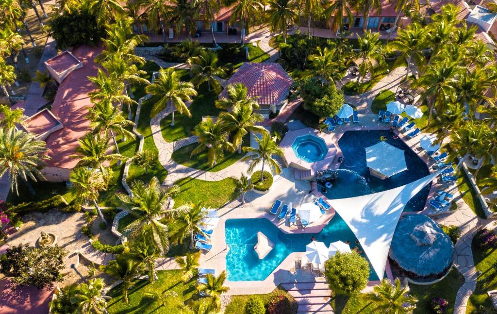 an overhead view of a resort with a swimming pool at Buena Vista Oceanfront & Hot Springs Resort in Buenavista