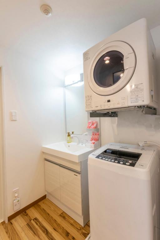 Kuchyň nebo kuchyňský kout v ubytování HOTEL HOUKLEA