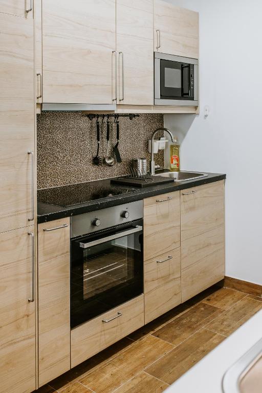 Kuchyň nebo kuchyňský kout v ubytování DREAMS HOUSE