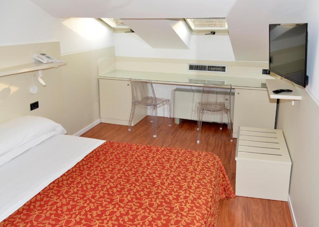 TV a/nebo společenská místnost v ubytování Hotel Amadeus E Teatro