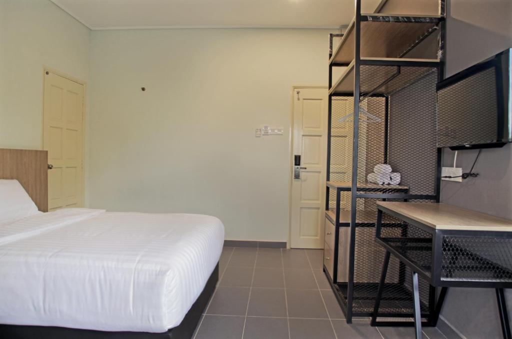 Postel nebo postele na pokoji v ubytování Hotel ali Imran