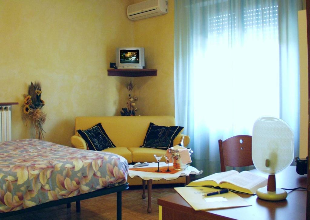 Postel nebo postele na pokoji v ubytování Hotel Paradiso