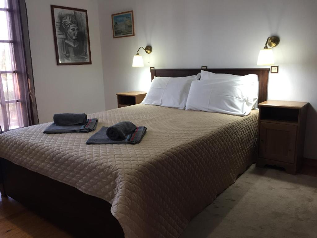 Postel nebo postele na pokoji v ubytování Alexander Apartments