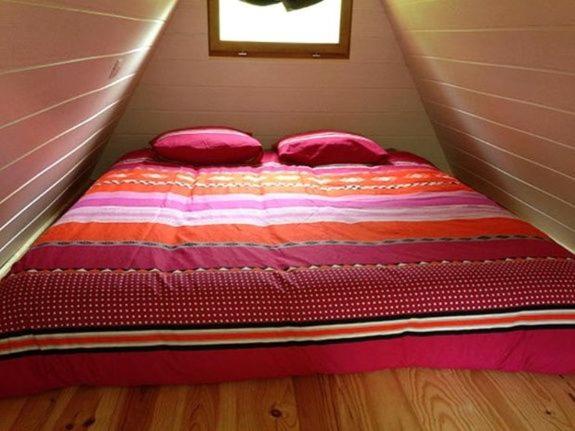 Postel nebo postele na pokoji v ubytování Camping Domaine de Mepillat