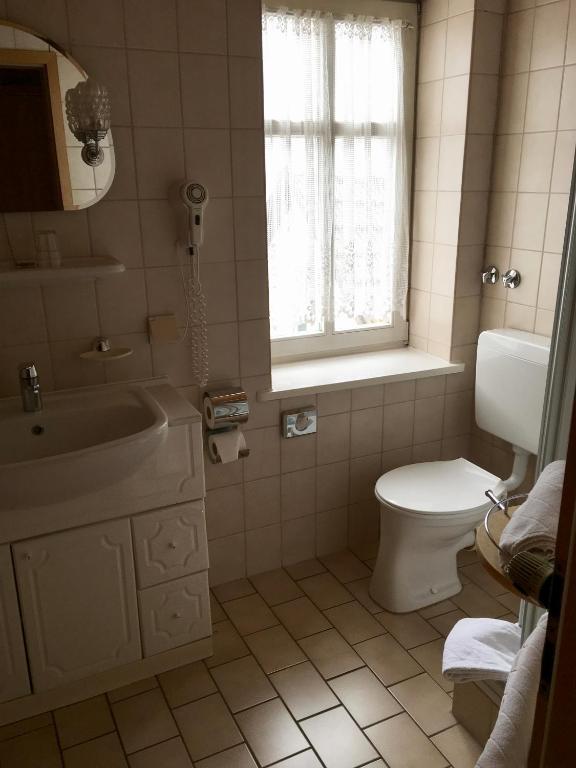 Koupelna v ubytování Hostaria del Castello