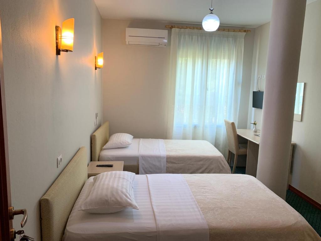 Postel nebo postele na pokoji v ubytování Kriva Resort
