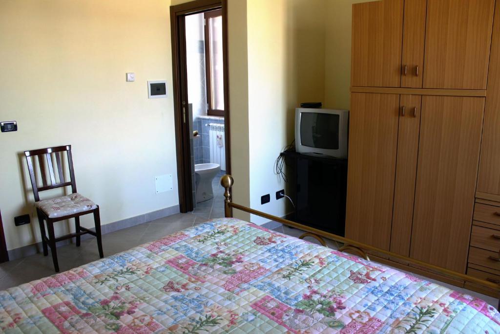 TV a/nebo společenská místnost v ubytování Bed and Breakfast Emilia