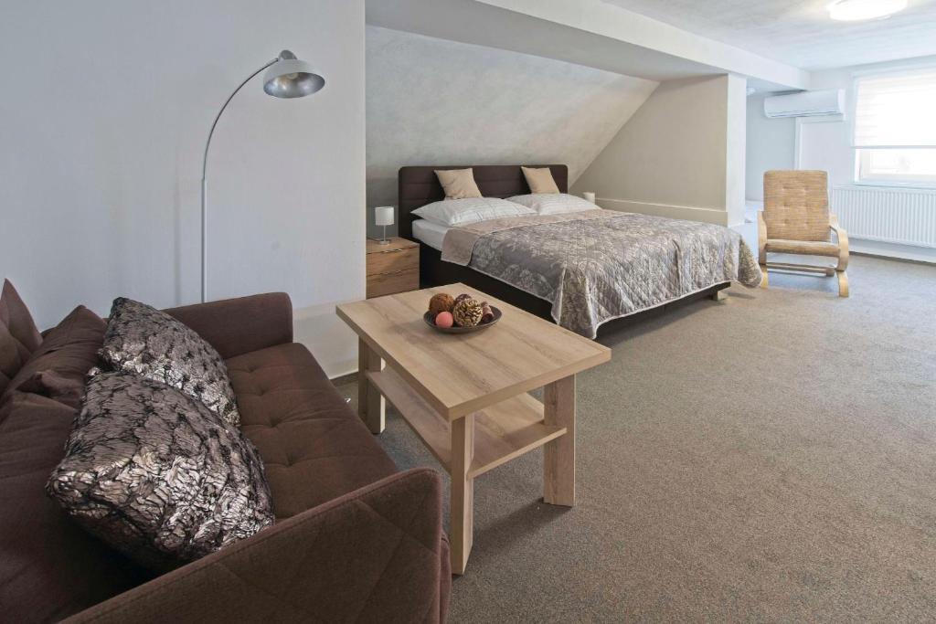 Postel nebo postele na pokoji v ubytování AV Penzion
