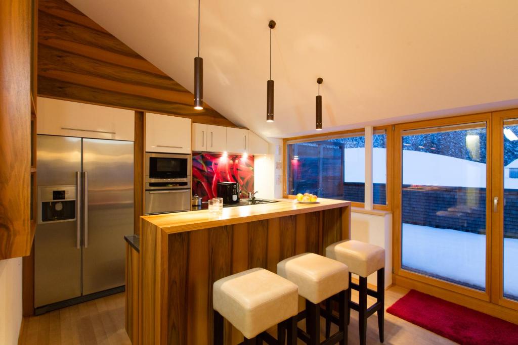 Kuchyň nebo kuchyňský kout v ubytování Alpenappartement Bergkönig