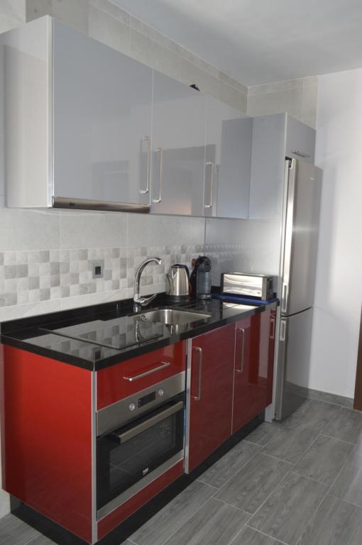 A kitchen or kitchenette at Apartamento Jazmín