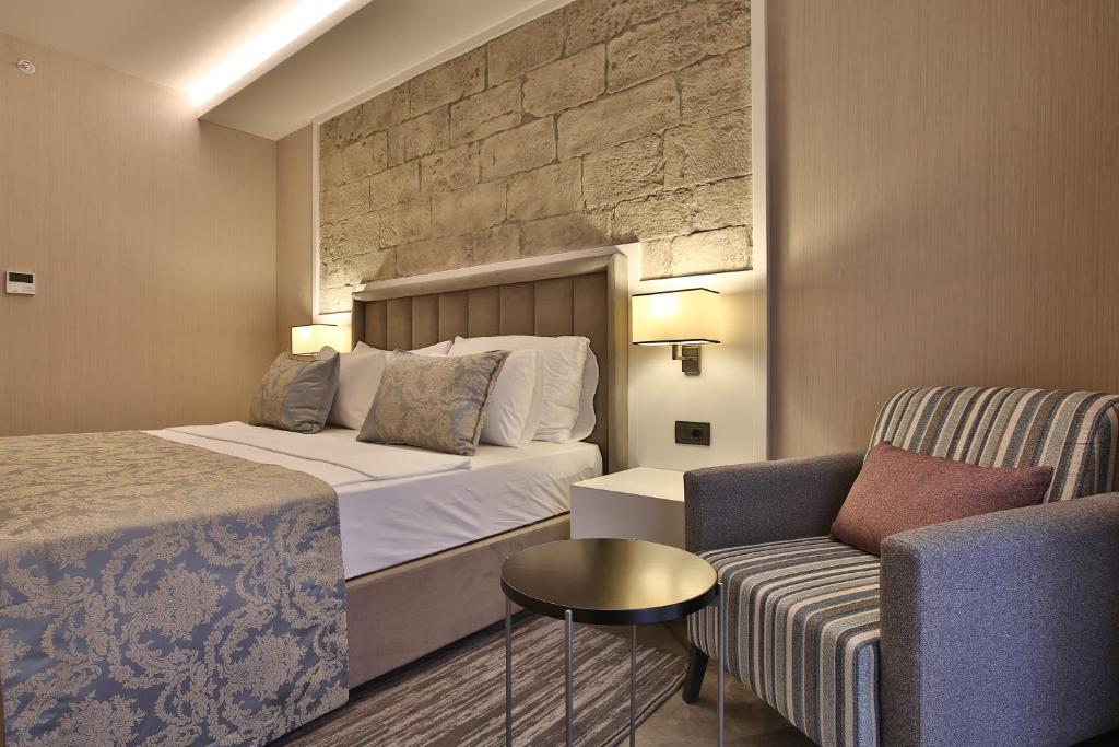Postel nebo postele na pokoji v ubytování Mardin Airport hotel
