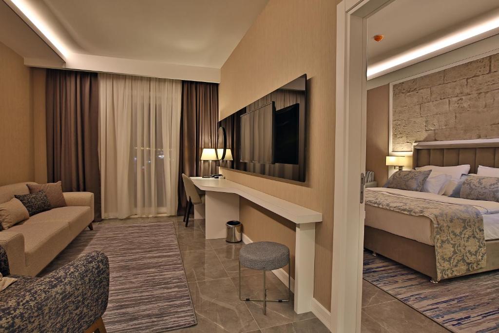 Postel nebo postele na pokoji v ubytování Mardin Airport hotel