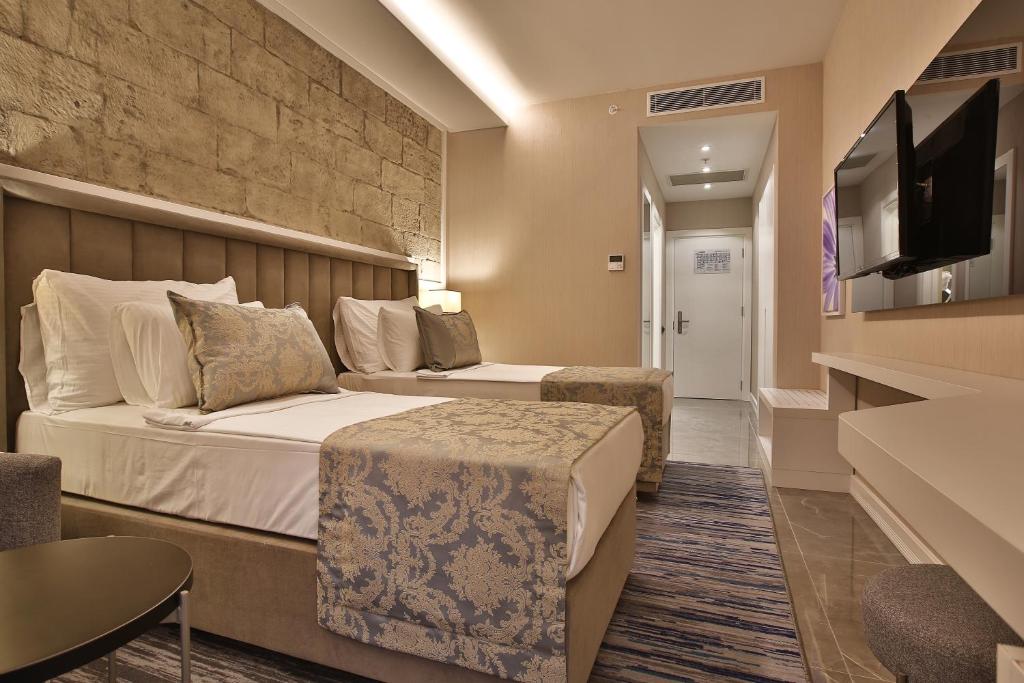 TV a/nebo společenská místnost v ubytování Mardin Airport hotel