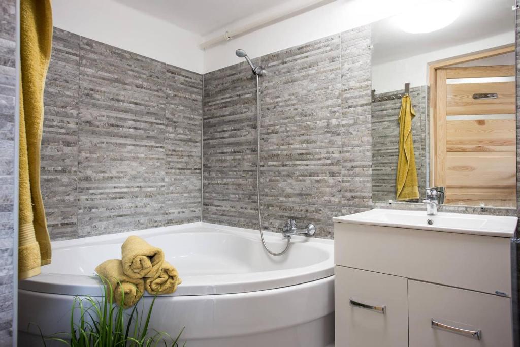 Kúpeľňa v ubytovaní Csigaház Apartman