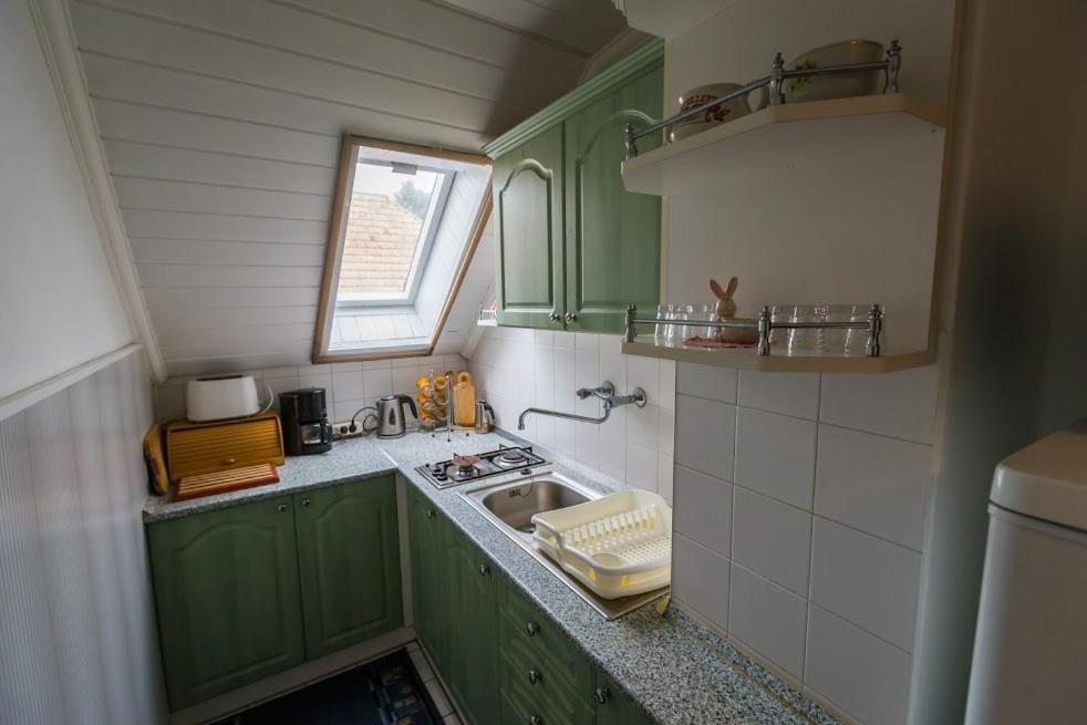 Kuchyň nebo kuchyňský kout v ubytování Joli Guesthouse
