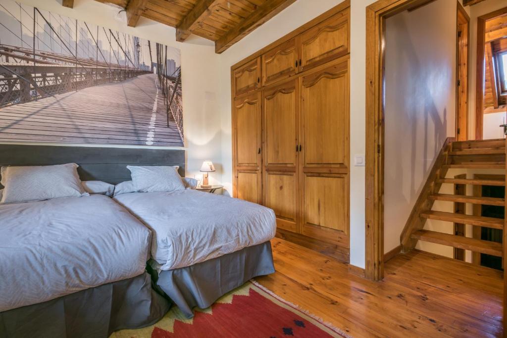 Postel nebo postele na pokoji v ubytování Casa Nautada by Totiaran