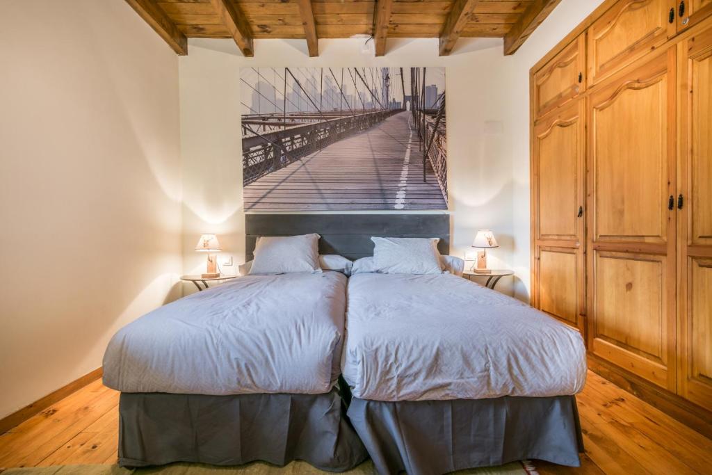 Postel nebo postele na pokoji v ubytování Casa Nautada by Totiaran