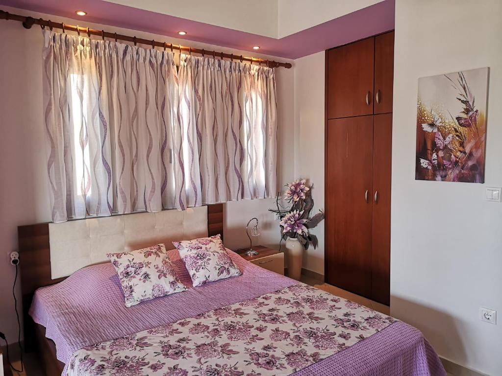 Voodi või voodid majutusasutuse Aracelia villas with private pool toas