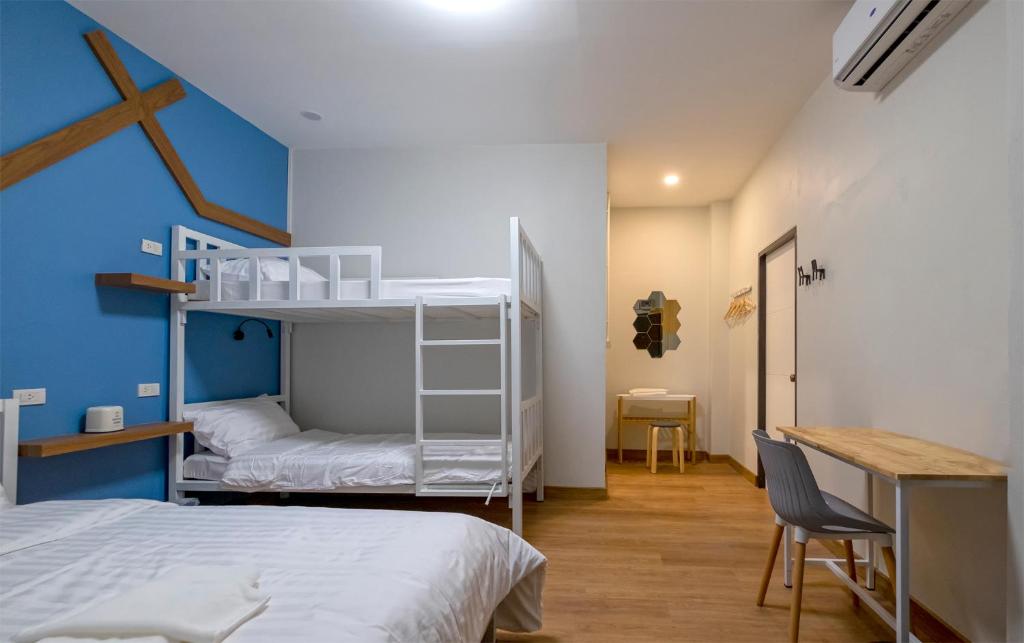 Postel nebo postele na pokoji v ubytování BED Friends Poshtel