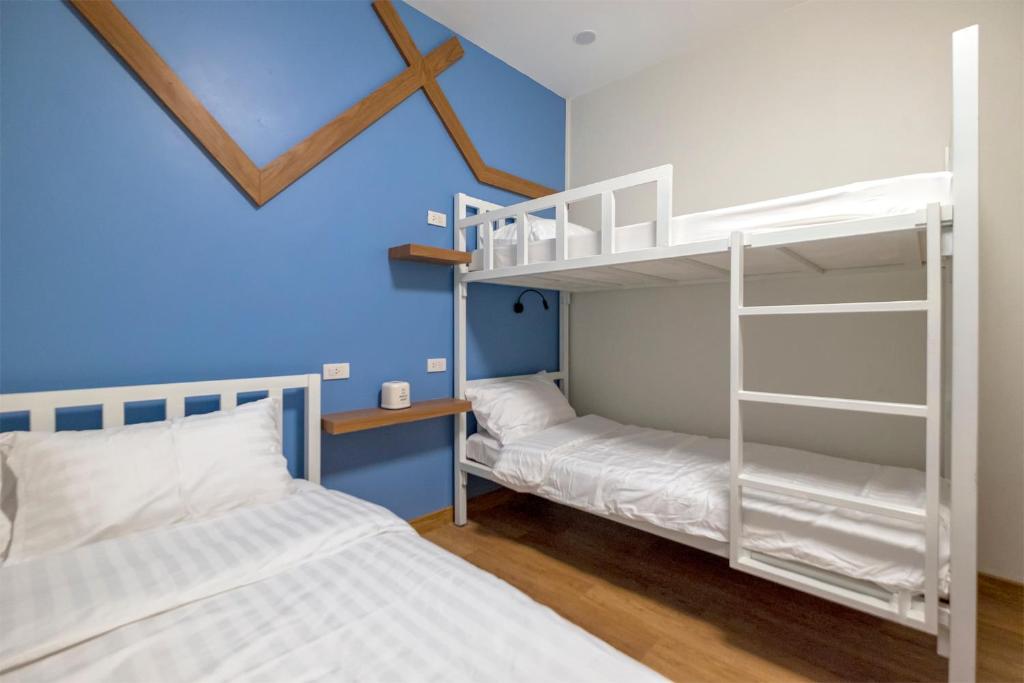 Postel nebo postele na pokoji v ubytování BED Friends Poshtel