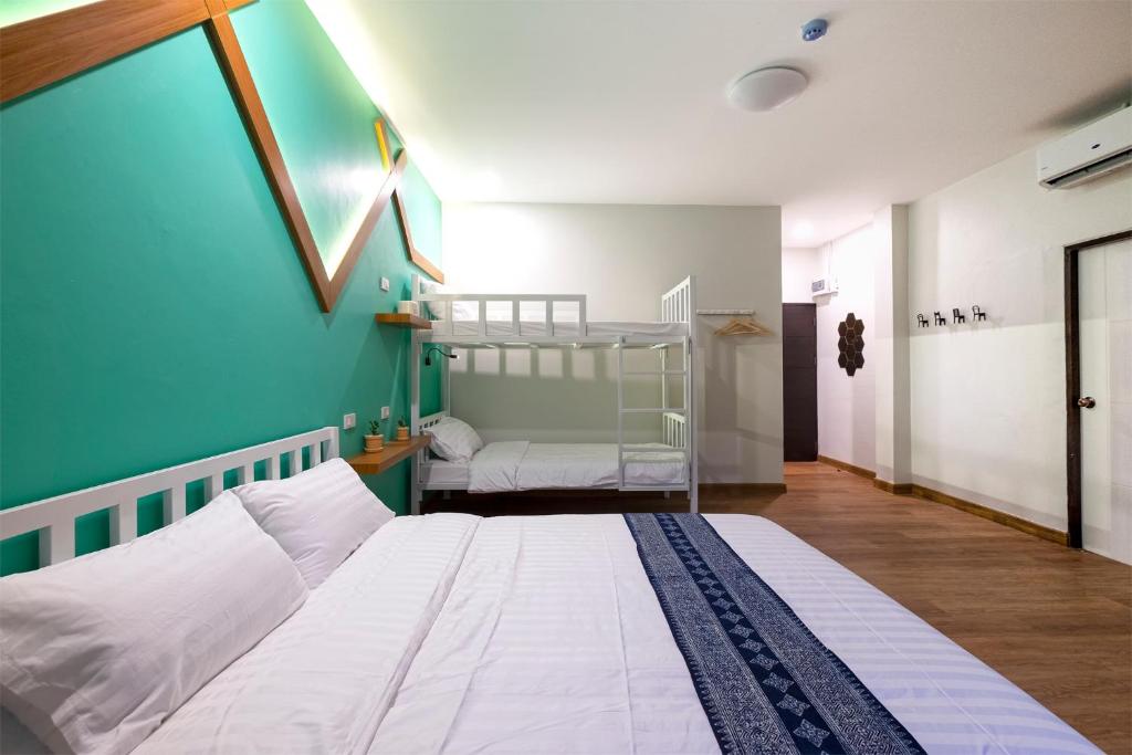 Postel nebo postele na pokoji v ubytování BED Friends Poshtel