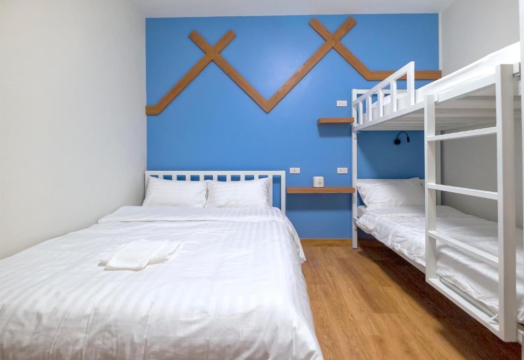 Postel nebo postele na pokoji v ubytování BED Friends Poshtel