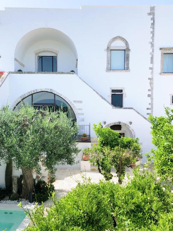 Сад в La Sommità Relais & Chateaux