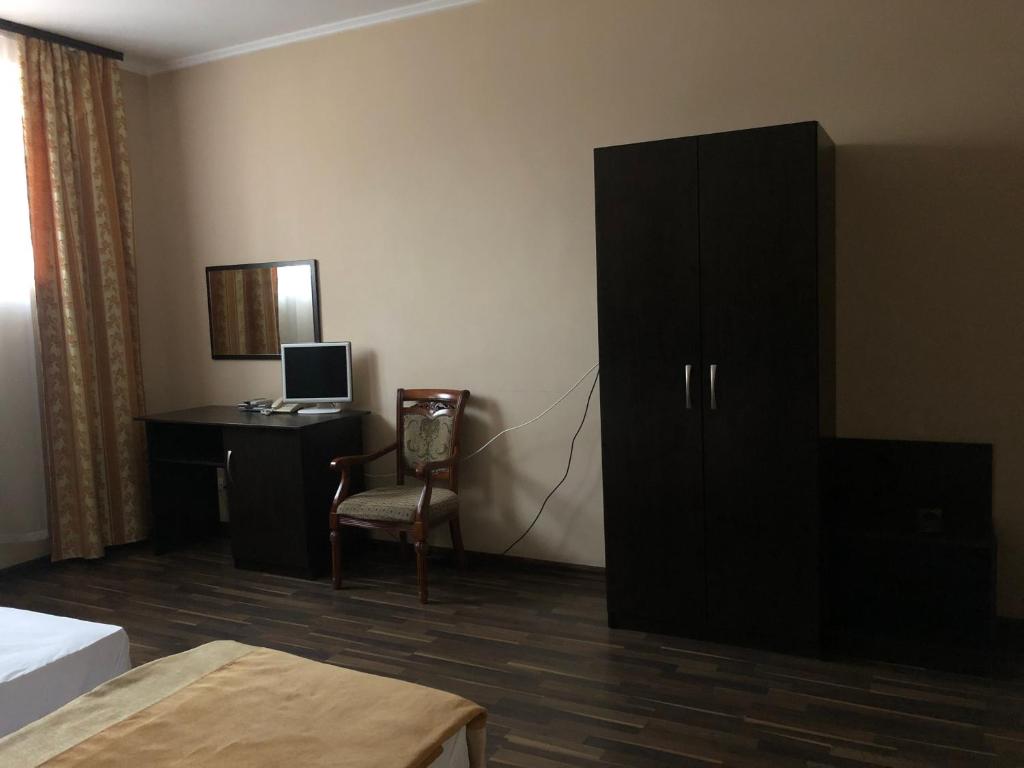 TV a/nebo společenská místnost v ubytování Admiral Hotel