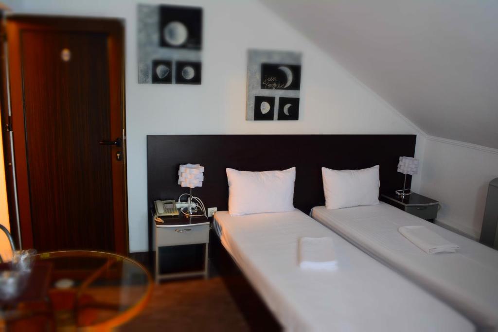 Postel nebo postele na pokoji v ubytování Motel Anghel