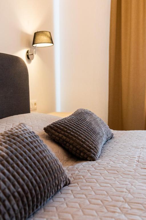 Postel nebo postele na pokoji v ubytování VIGEO lounge b&b coffee