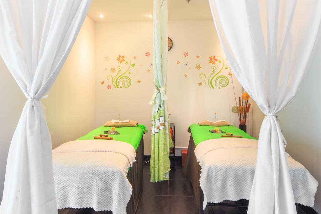 Postel nebo postele na pokoji v ubytování Pop Art Hotel Tocancipá y Centro de Convenciones