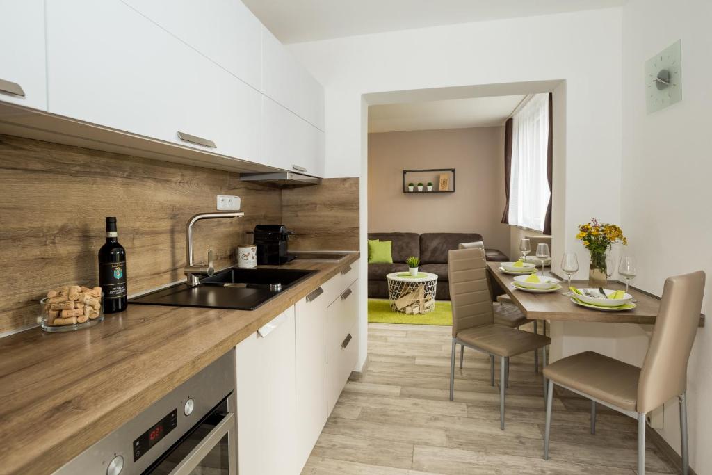 Kuchyň nebo kuchyňský kout v ubytování Apartmány Stožec - Nella Premium